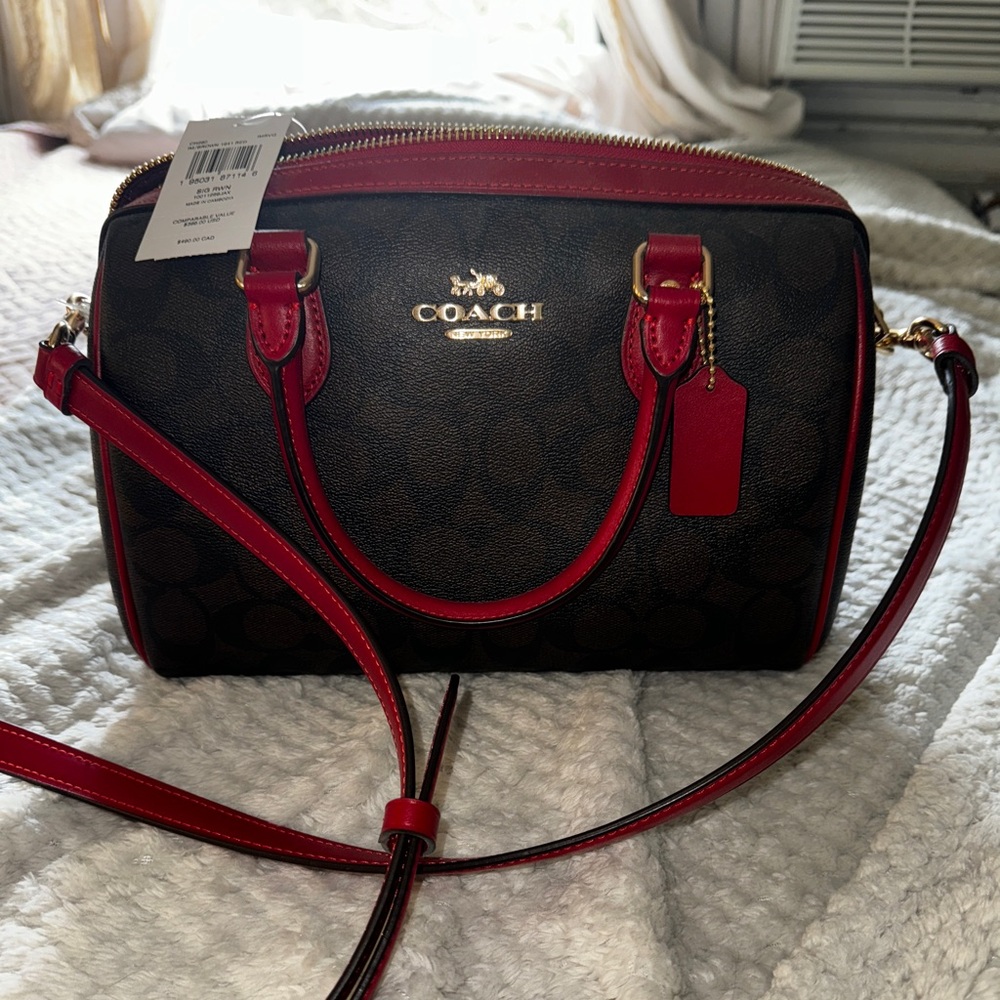 Brand new never been used coach bag so cute and color combo looks great